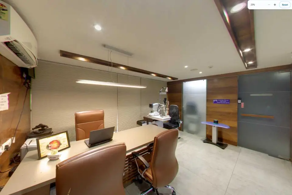 Doctor's consulting room with desk and examination chair