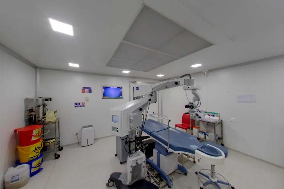 Operating theatre with patient bed and equipment